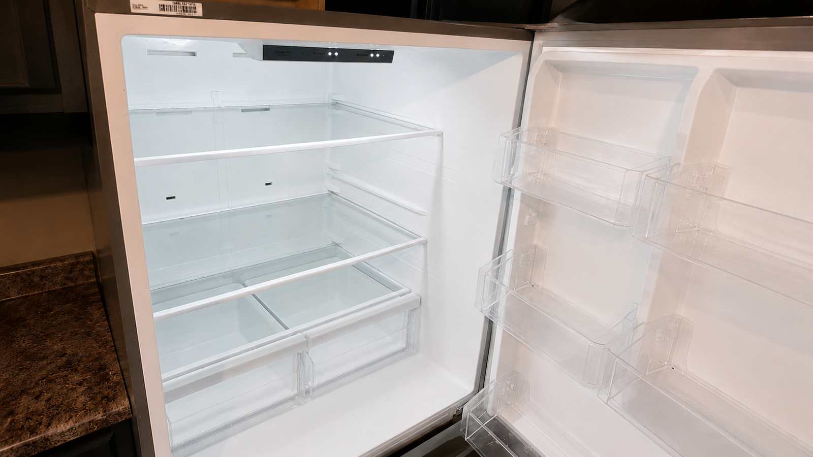 The same refrigerator interior with every shelf and surface cleaned and sanitized.